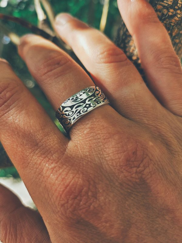 Stylish handmade sterling silver ring with ornament