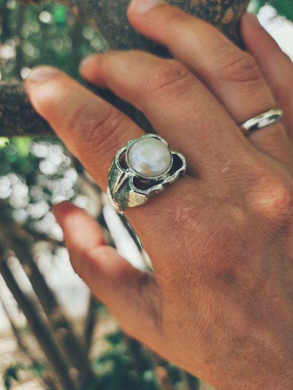 Handcrafted designer ring made of sterling silver with natural pearls