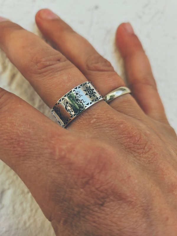 Stylish handmade sterling silver ring with ornament