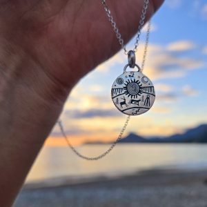 Sterling silver pendant with ancient symbols