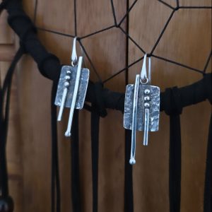 Strange designer earrings